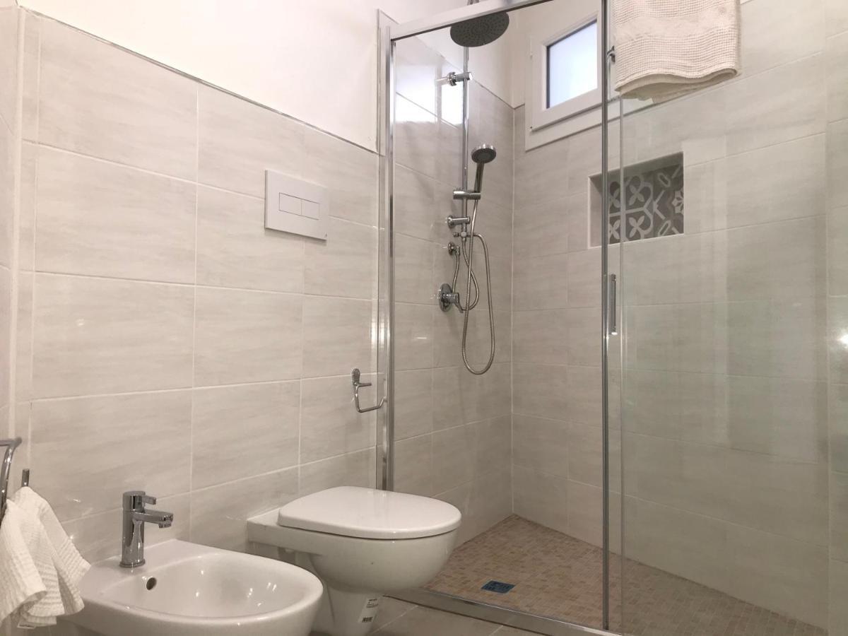 Angolo Mare Apartment&Rooms Porto Pino Esterno foto