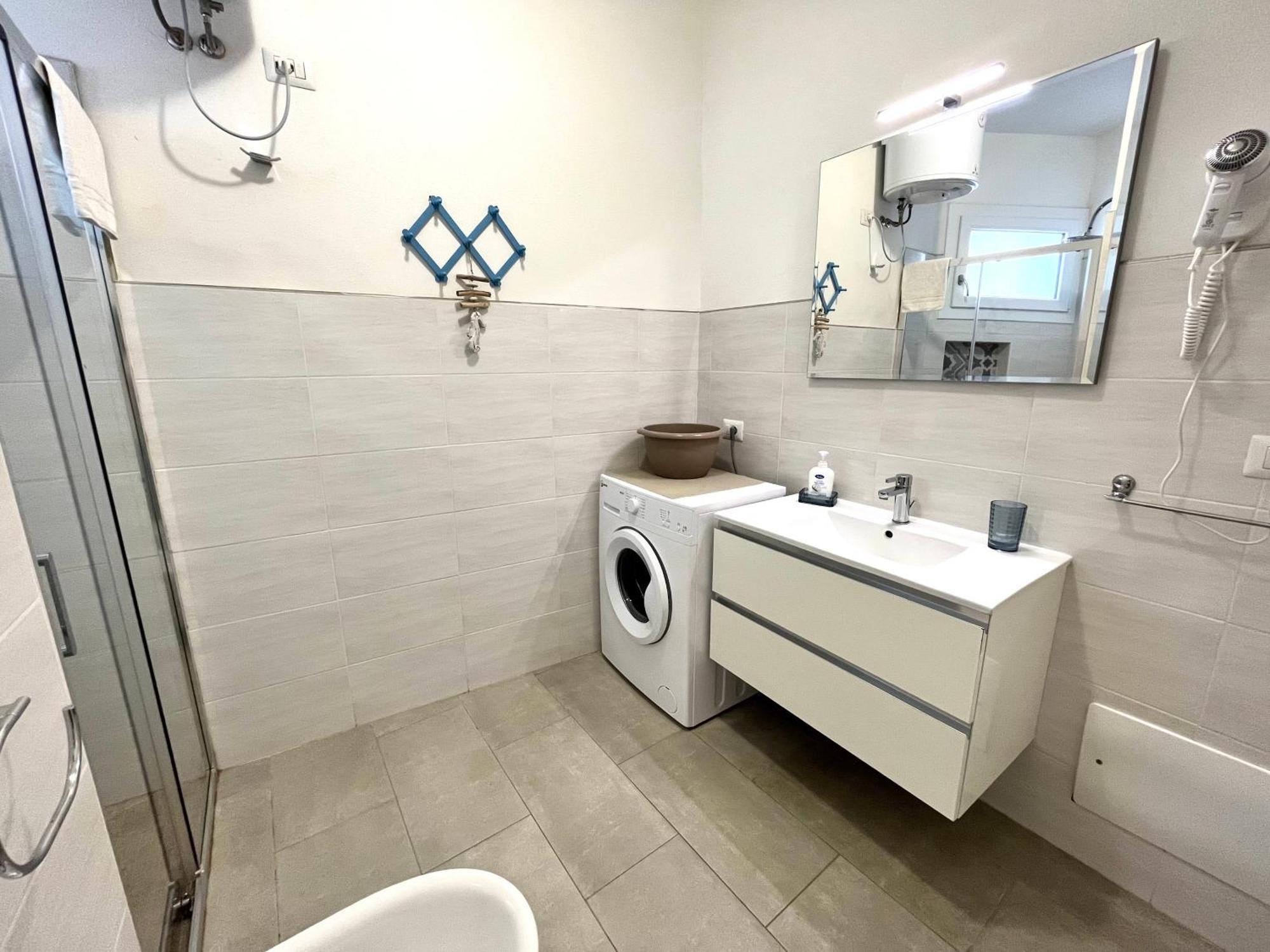 Angolo Mare Apartment&Rooms Porto Pino Esterno foto