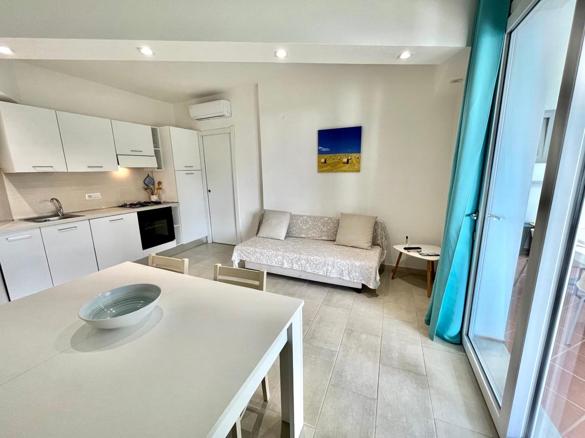 Angolo Mare Apartment&Rooms Porto Pino Esterno foto