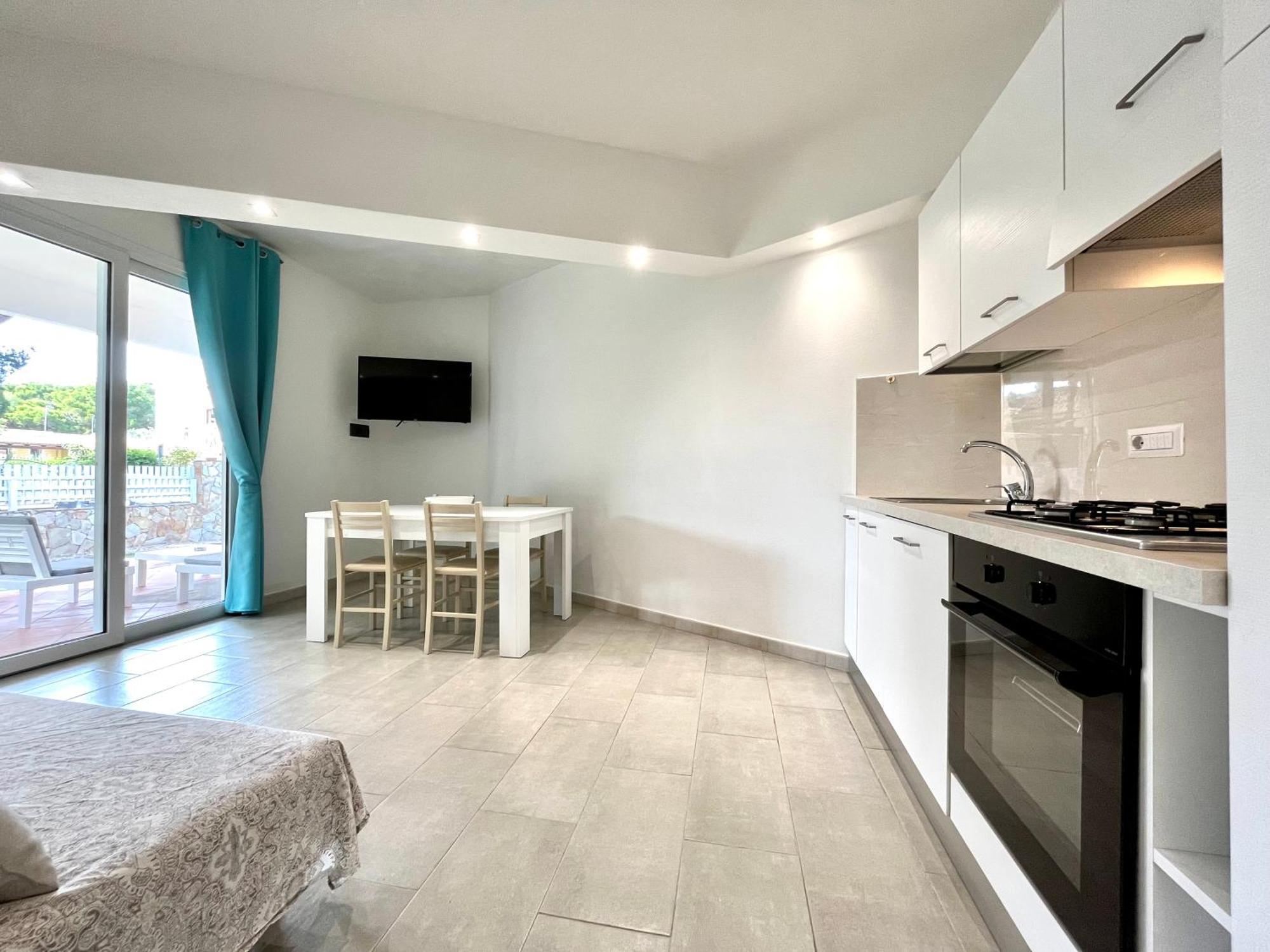 Angolo Mare Apartment&Rooms Porto Pino Esterno foto